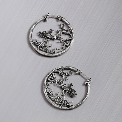 Pair of silver Graveyard Bat hoop earrings shown open and closed
