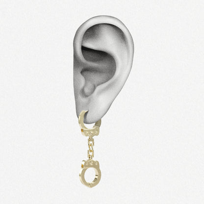 Gold Handcuff Chain drop earring shown on an ear illustration