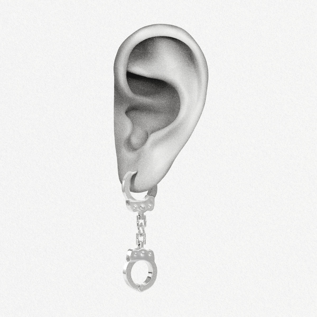 Illustrated ear wearing a silver-tone handcuff chain earring in sketch style