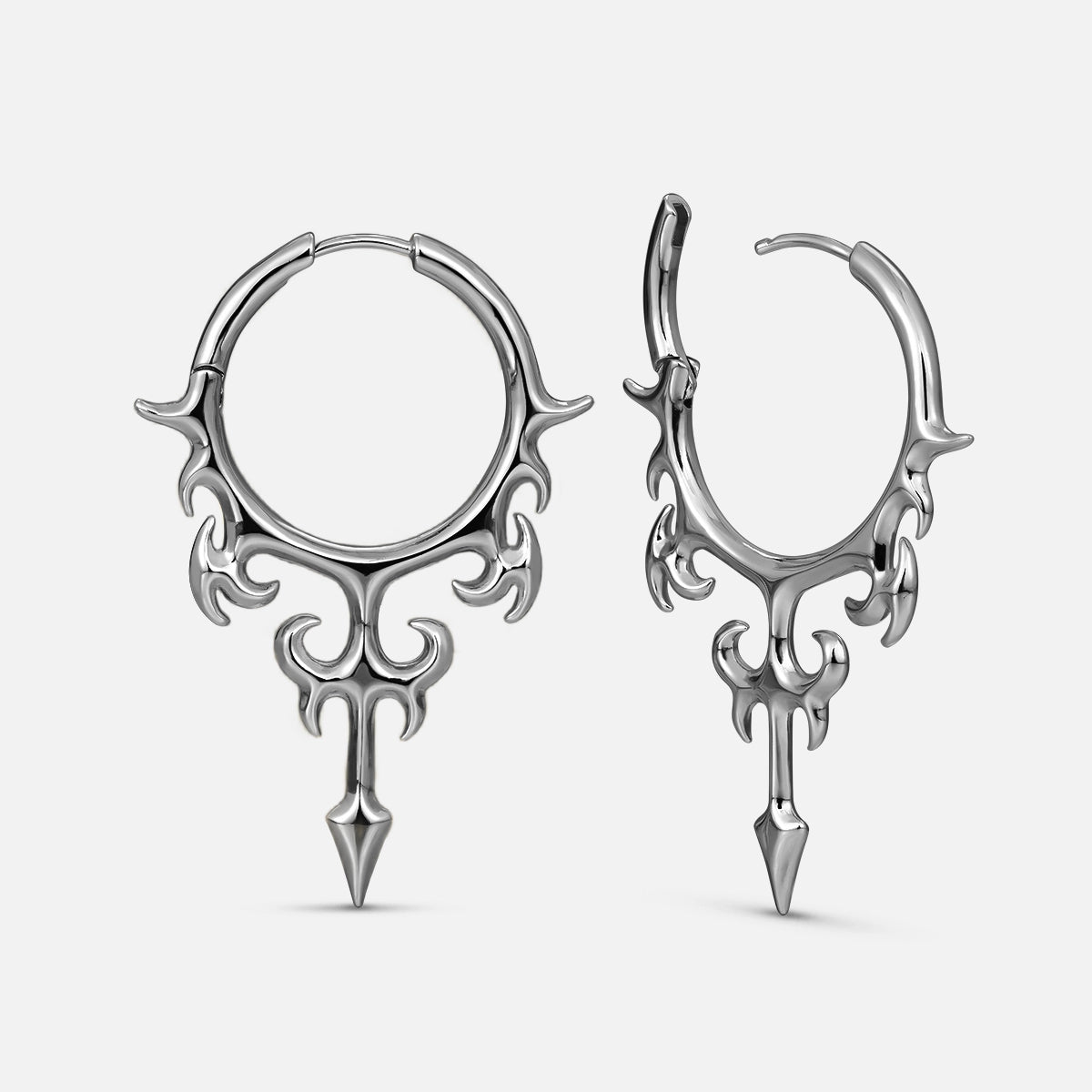 Silver-tone Hellflame Blade hoop earrings with flame-like scrollwork and pointed dagger drops
