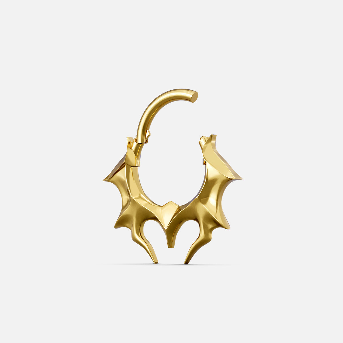 Gold-tone Infernal Horn Clicker shown open with a hinged closure and angular horn-inspired details.