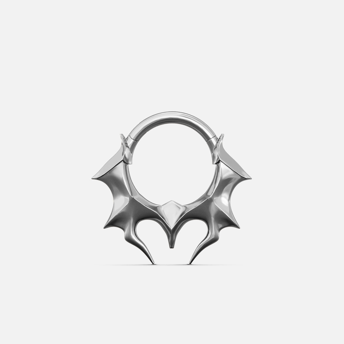 Silver-tone Infernal Horn Clicker with symmetrical pointed horn accents along the lower half of the ring.