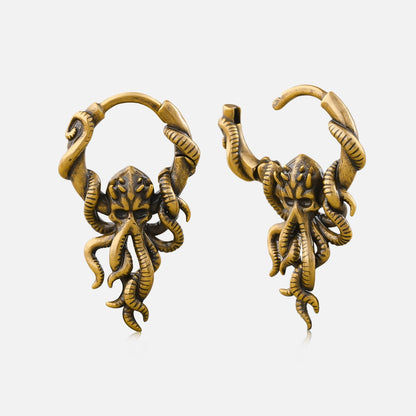 Pair of antique gold-tone hoop earrings featuring a kraken skull with tentacle wrap design