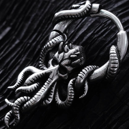 Close-up of silver Kraken Mystique hoop earring with curled tentacle details