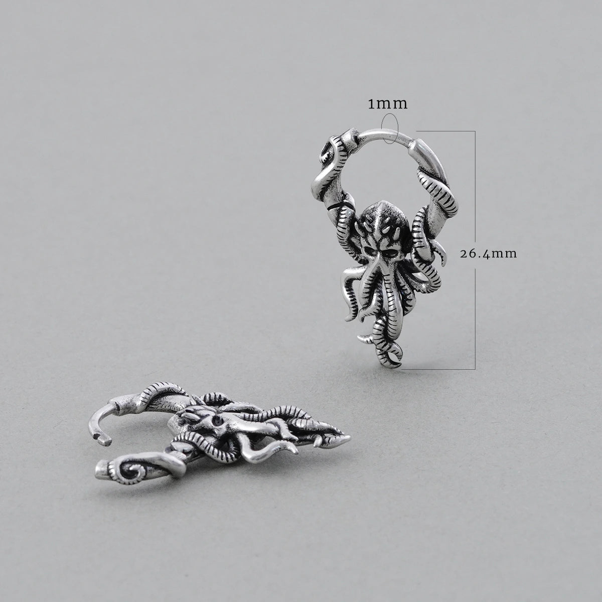 Silver Kraken Mystique hoop earring shown upright and flat with dimensions