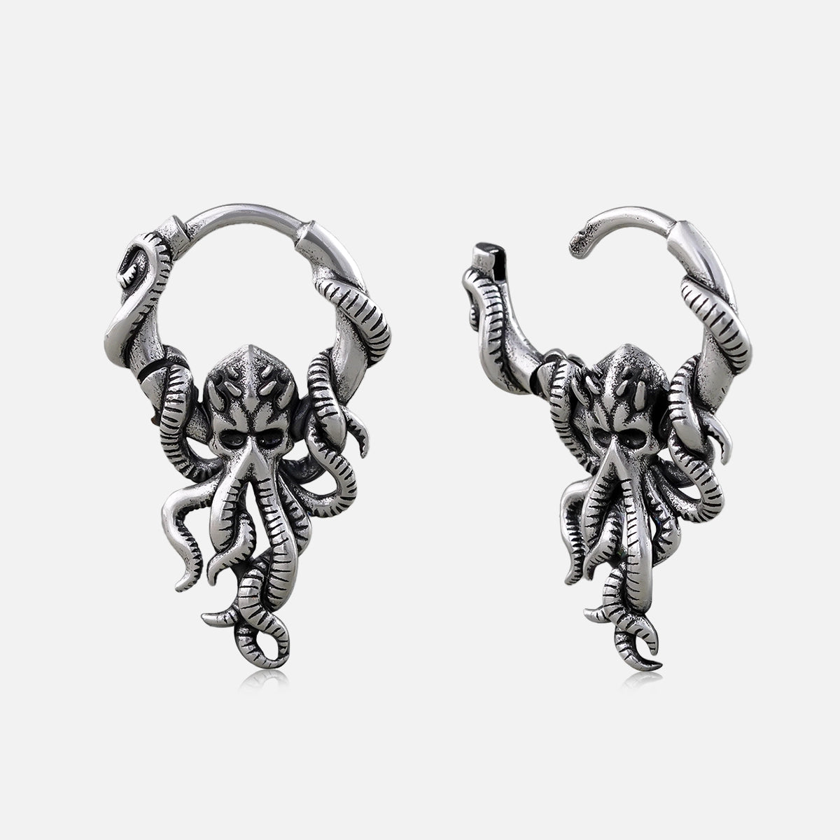 Silver-tone Kraken Mystique hoop earrings with detailed octopus pendants