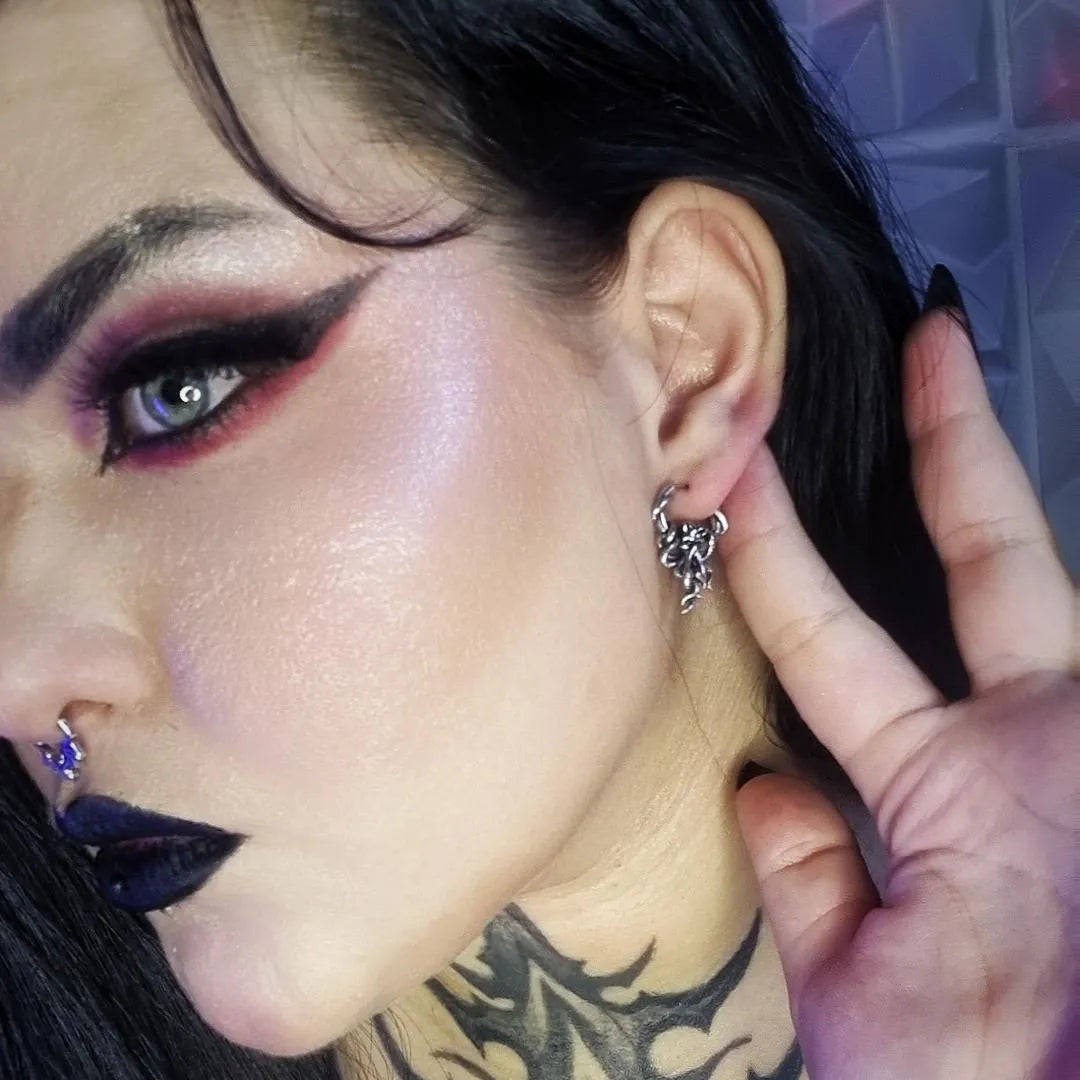 Silver Kraken Mystique Earrings styled on model with sculpted octopus tentacles and dark ocean gothic look