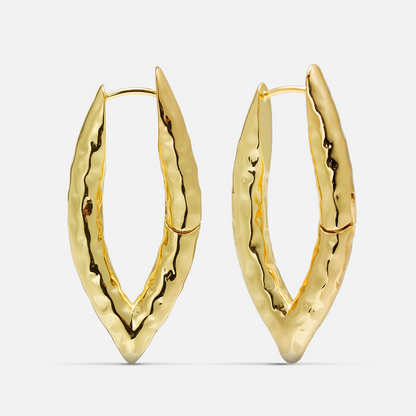 Pair of gold-tone liquid metal hoop earrings with a hammered, elongated V-shaped design
