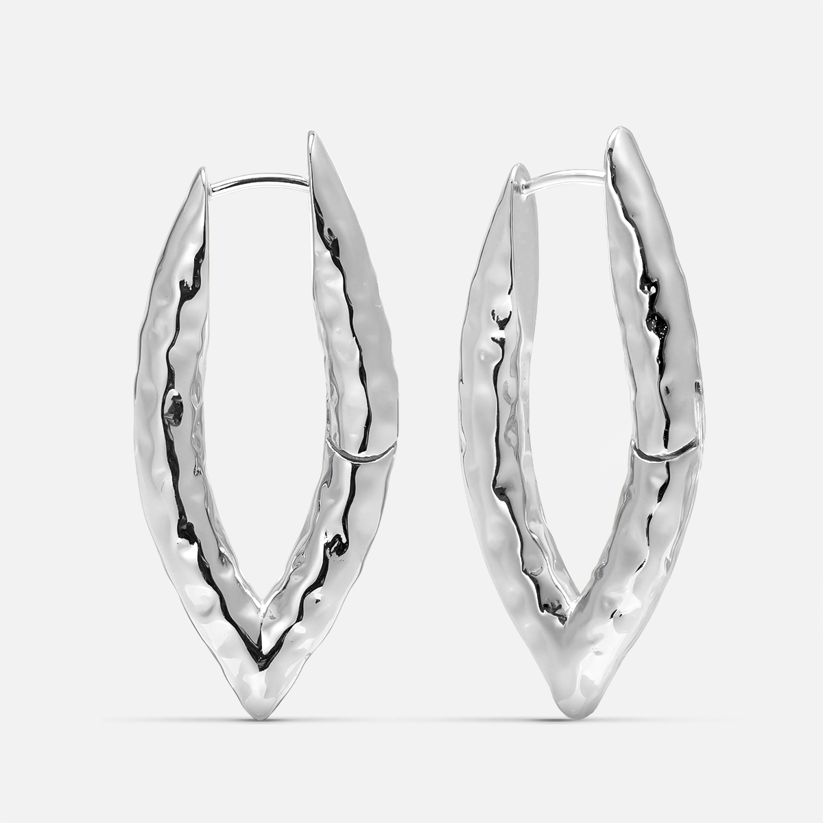 Pair of silver-tone liquid metal hoop earrings with a hammered, elongated V-shaped design