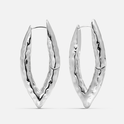 Pair of silver-tone liquid metal hoop earrings with a hammered, elongated V-shaped design