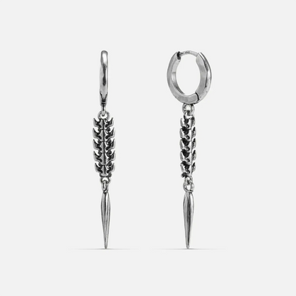 Longinus Abyss Stinger Earrings in 925 sterling silver, pair shown front and back on white, featuring a segmented spine body 
