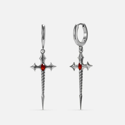 Longinus Godpiercer Earrings in 925 sterling silver, pair shown front and back on white, featuring red stone centers and twis