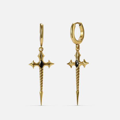 Pair of gold-tone sword-shaped dangle earrings with black gems attached to hoop closures