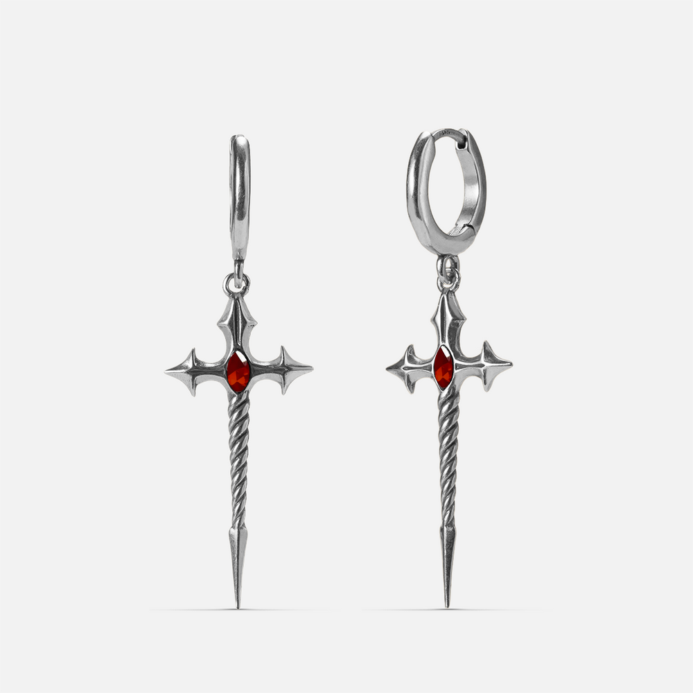 Silver-tone Longinus Godpiercer earrings with red stones, twisted shafts, and spear points