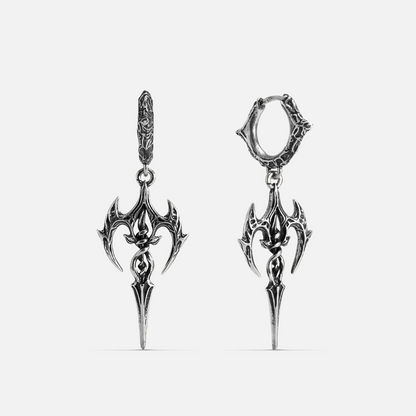 Silver-tone Longinus Halo Piercer earrings with ornate winged blade pendants