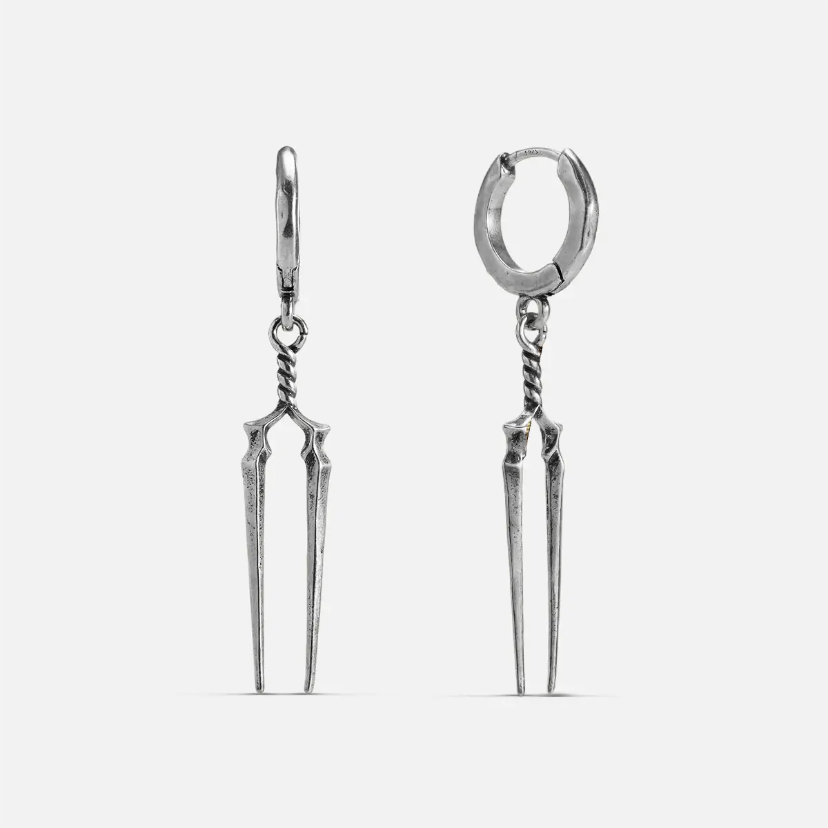Longinus Twin Spear Earrings in 925 sterling silver, pair shown front and back on white, featuring two long spear-shaped drop