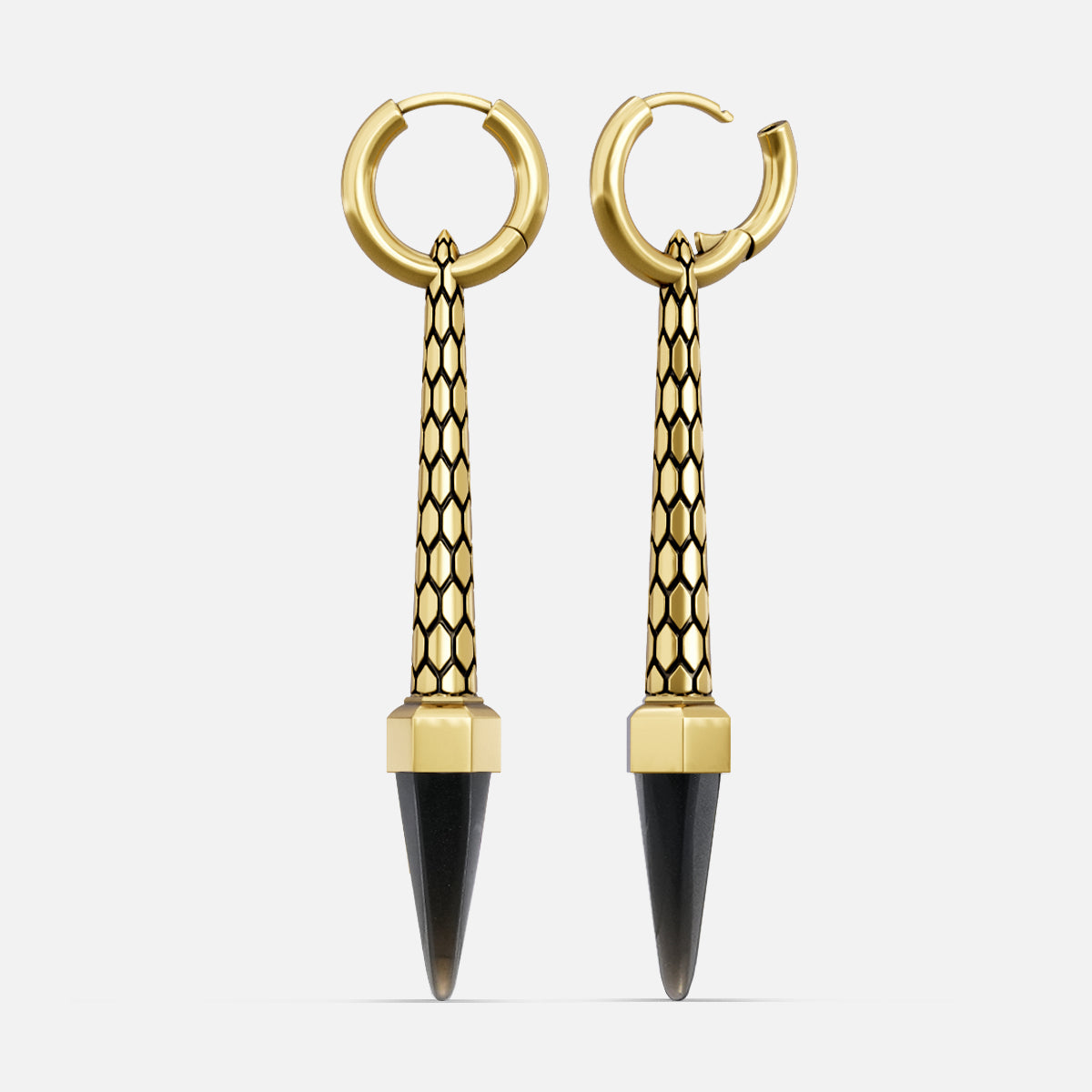 Gold-tone hoop earrings with honeycomb-textured bars and dark pointed crystal drops, front view