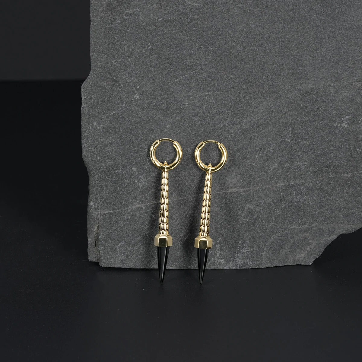 Pair of gold Lucent Prism earrings with black pointed drops