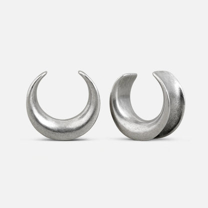 Pair of silver Lunar Eclipse tunnels with crescent-shaped openings