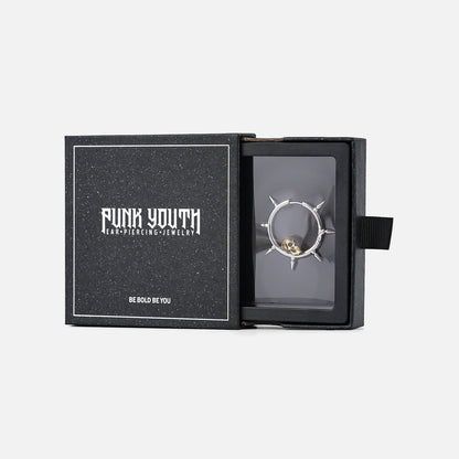Silver Memento Skull hoop earring presented in a black jewelry box