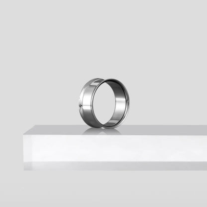 Silver Minimalist Loop titanium tunnel displayed upright on a white pedestal