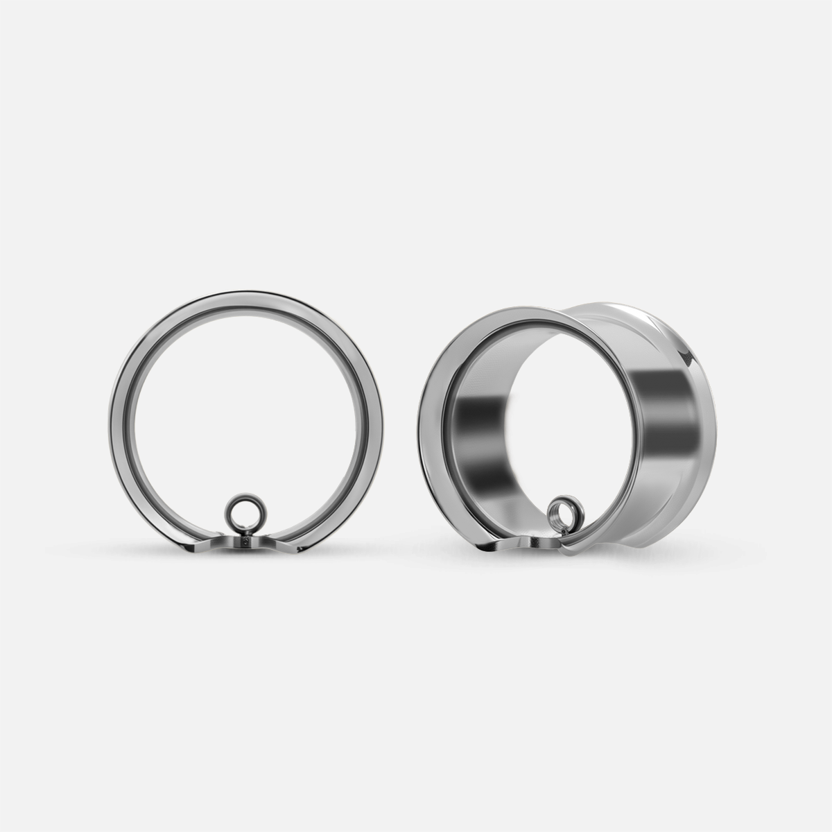 Silver-tone Modular Ring tunnels shown from the front and side with a smooth round profile