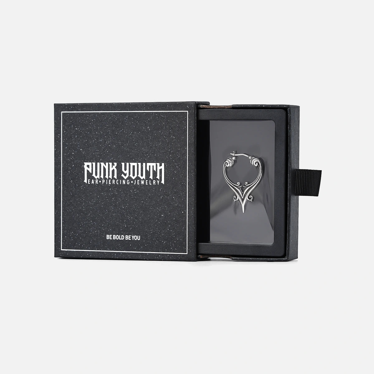 Silver Mystic Crest heart hoop earring presented in a black jewelry box