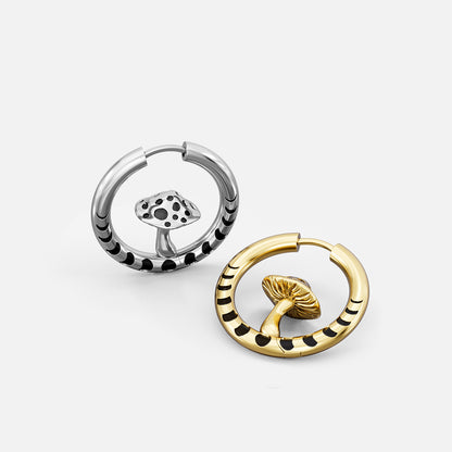 Silver and gold Mystic Fungi hoop earrings shown open and lying flat