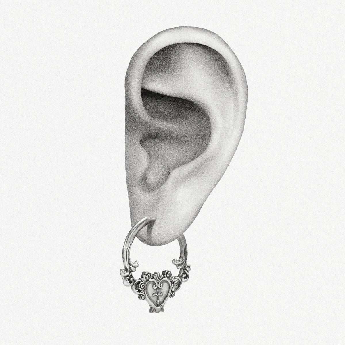 Silver Ornate Affection hoop earring shown on an ear illustration