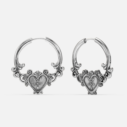Silver-tone Ornate Affection hoop earrings with decorative heart-shaped centers