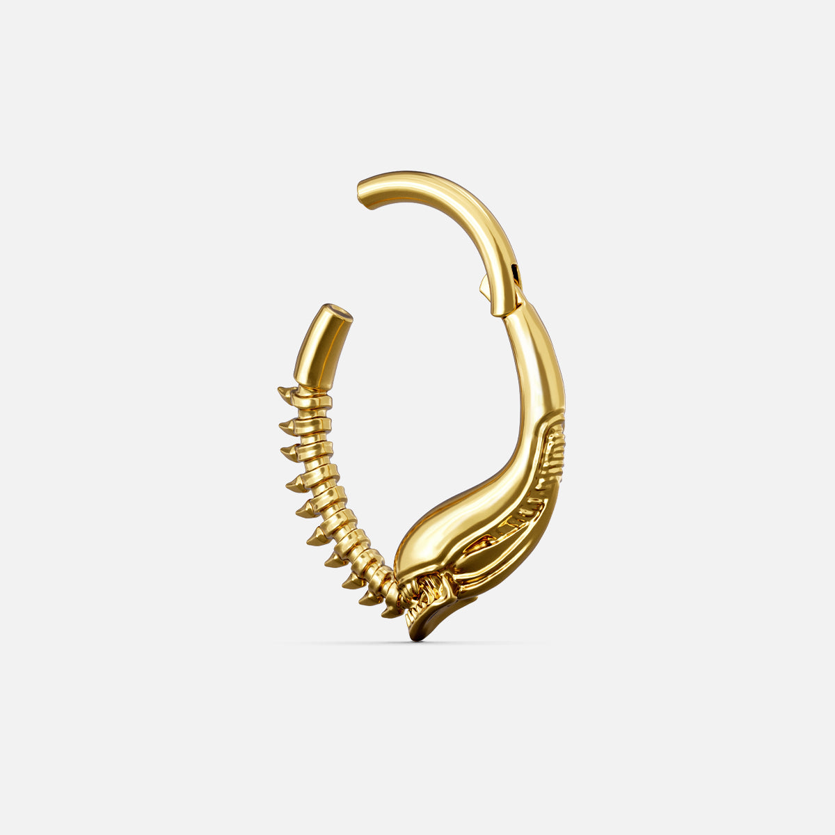 Gold-tone Ouroboros Clicker shown open with a hinged closure and raised serpent-like ridges.