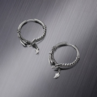 Pair of silver Ouroboros Dragon hoop earrings shown open and closed