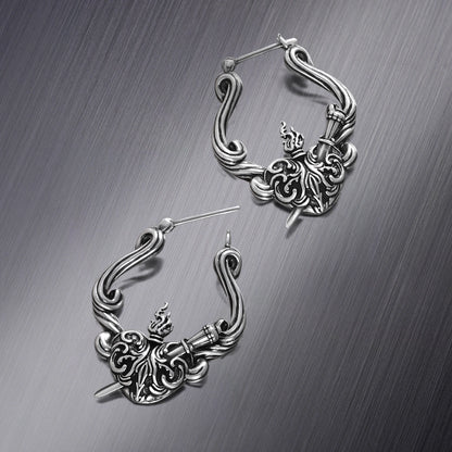 Pair of silver Passionate Heart hoop earrings shown open and closed