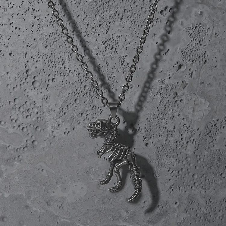 Silver Prehistoric Power necklace with dinosaur skeleton pendant
