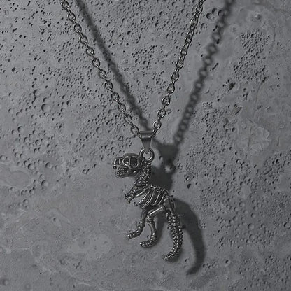 Silver Prehistoric Power necklace with dinosaur skeleton pendant