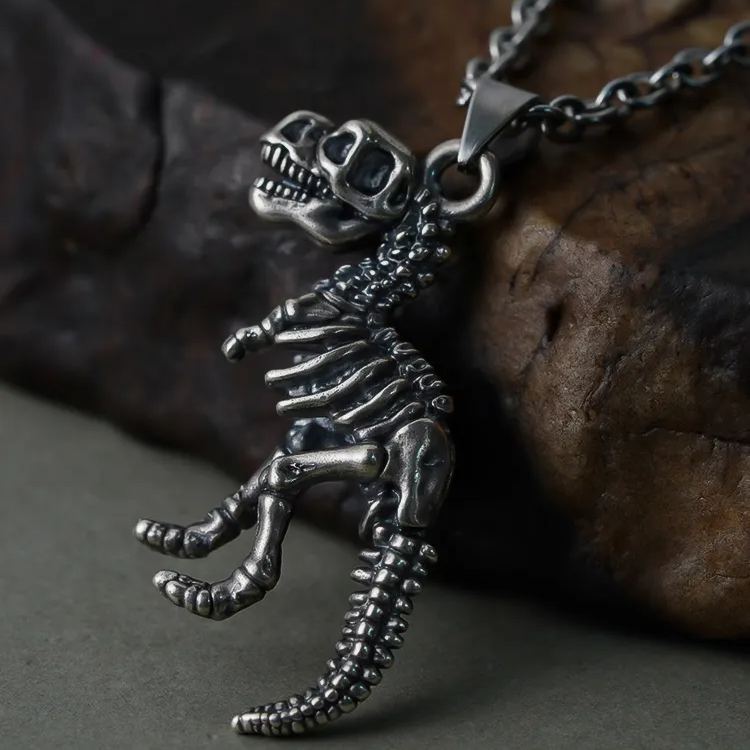 Close-up of silver Prehistoric Power dinosaur skeleton pendant
