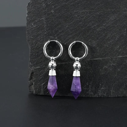 Silver Prism Orb Earrings displayed on a dark stone surface, featuring faceted amethyst crystal drops, orb bead details, and polished hoops.