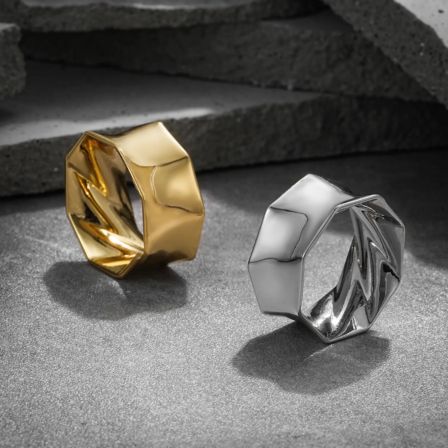 Gold and silver Prismatic Harmony tunnels displayed on dark blocks