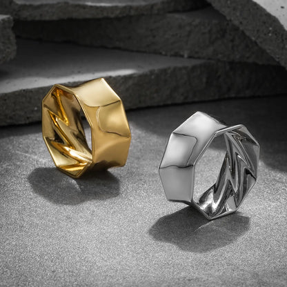 Gold and silver Prismatic Harmony tunnels displayed on dark blocks