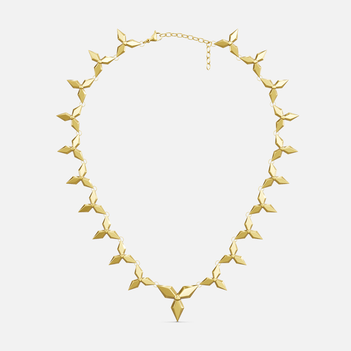 Gold-tone petal necklace with layered diamond-shaped links and a pointed pendant, laid flat