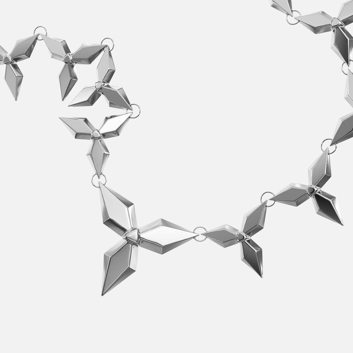Close-up of silver Punk Petal necklace with pointed geometric petal links