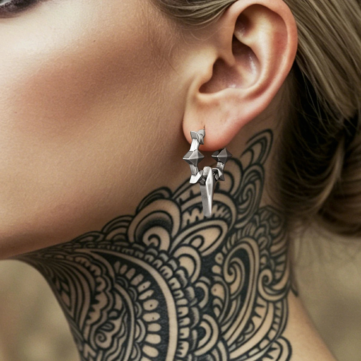Punkyouth Celestial spike earrings featuring four-point stars and pointed hoop silhouettes, product image 02