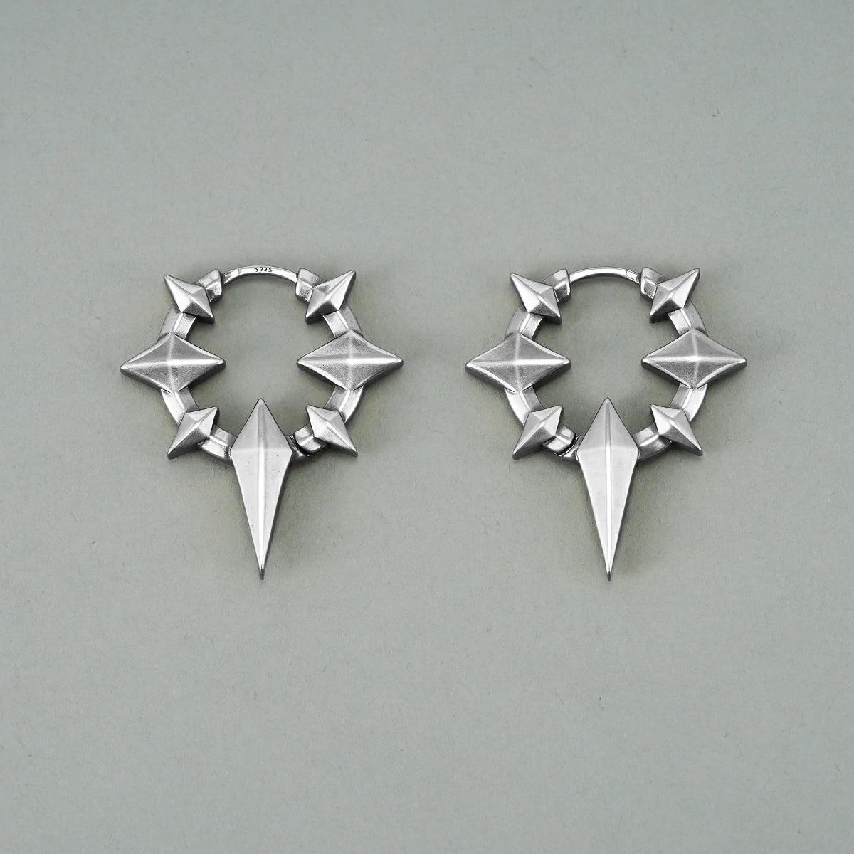 Punkyouth Celestial spike earrings featuring four-point stars and pointed hoop silhouettes, product image 07
