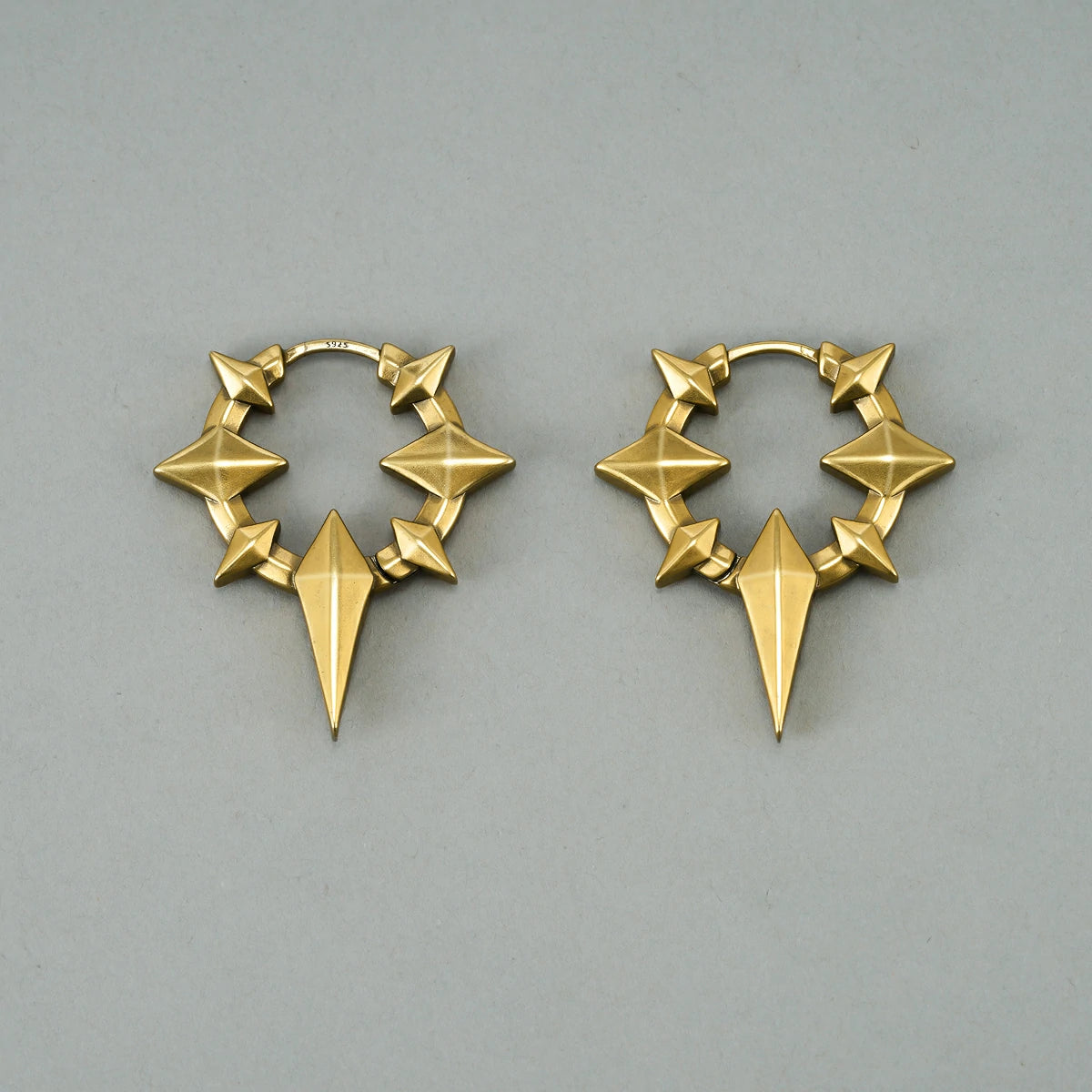 Punkyouth Celestial spike earrings featuring four-point stars and pointed hoop silhouettes, product image 08