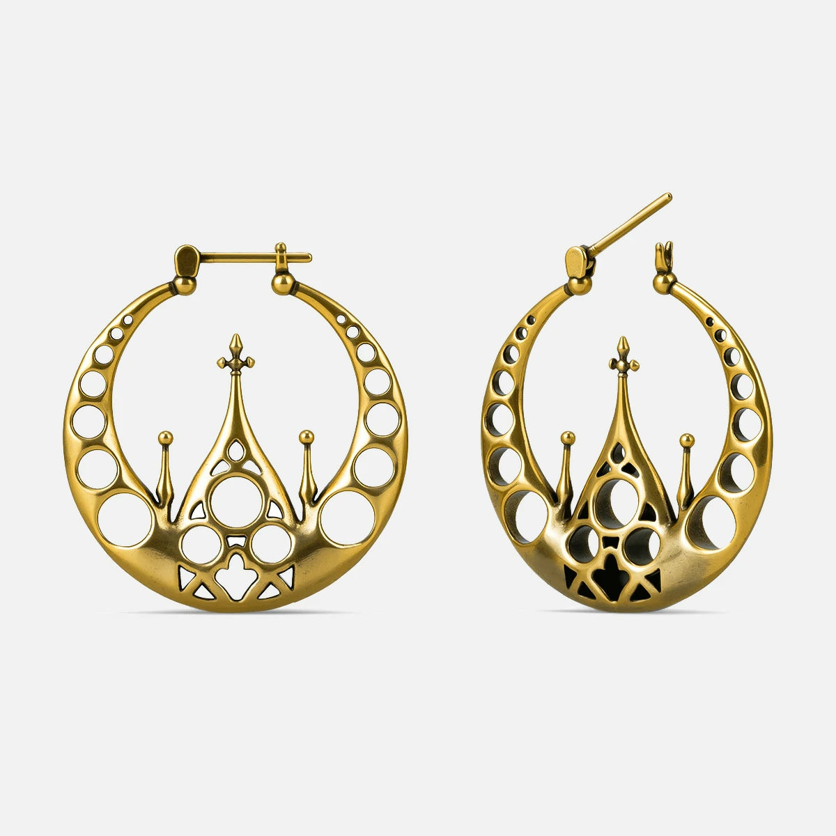 Punkyouth Gothic halo earrings in gold, featuring openwork circular hoops and cathedral-inspired spires