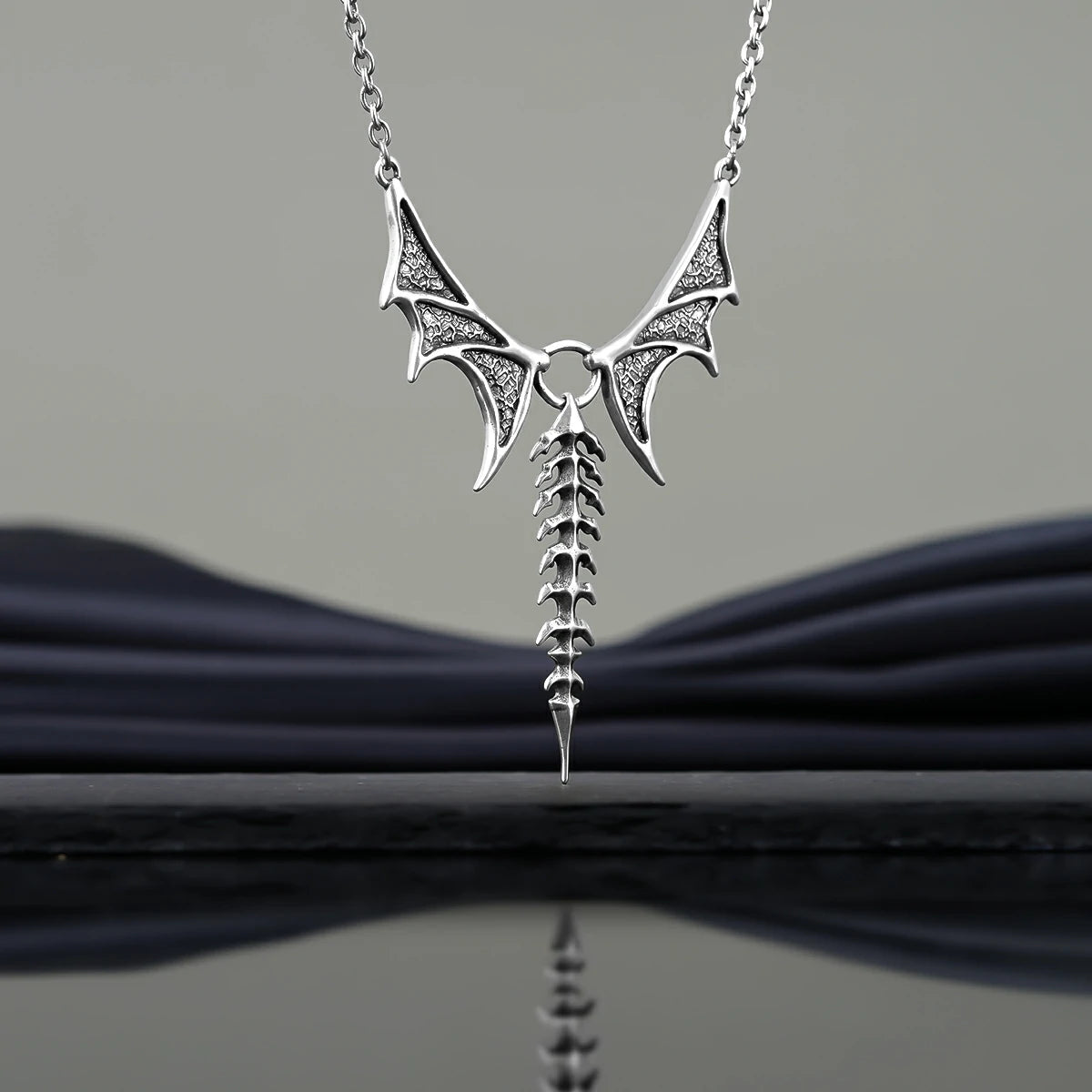Punkyouth Nocturnal spine necklace featuring sculpted bat wings and vertebra-inspired drop pendant, product image 08