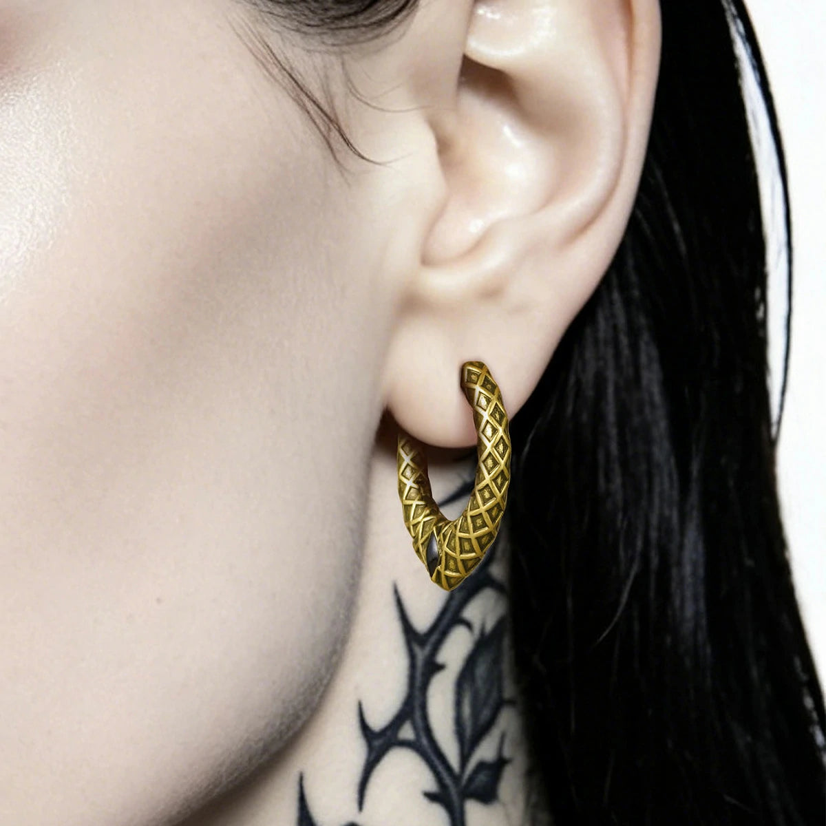 Punkyouth Serpent scale earrings featuring scale-textured hoops and black resin accents, product image 05