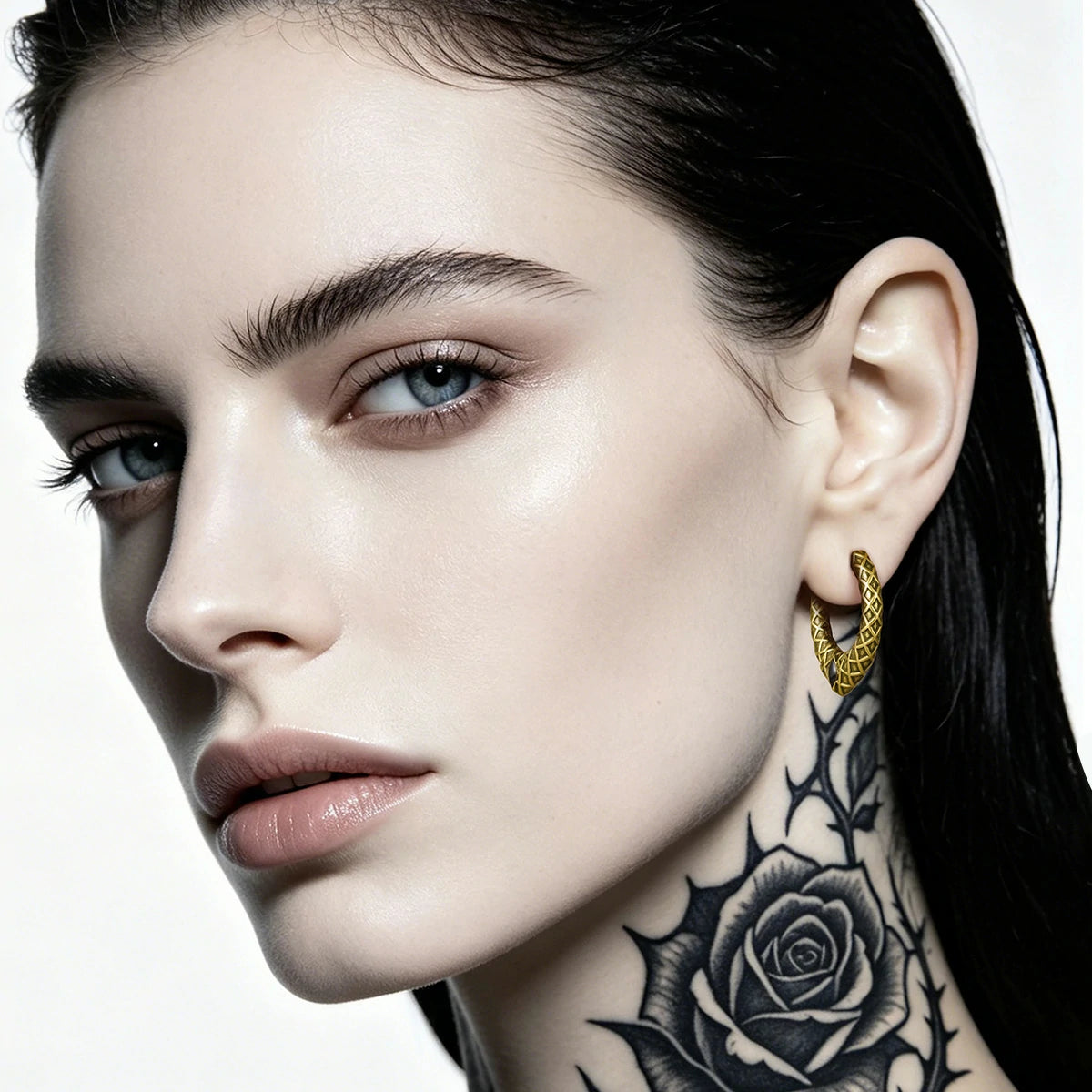 Punkyouth Serpent scale earrings featuring scale-textured hoops and black resin accents, product image 06
