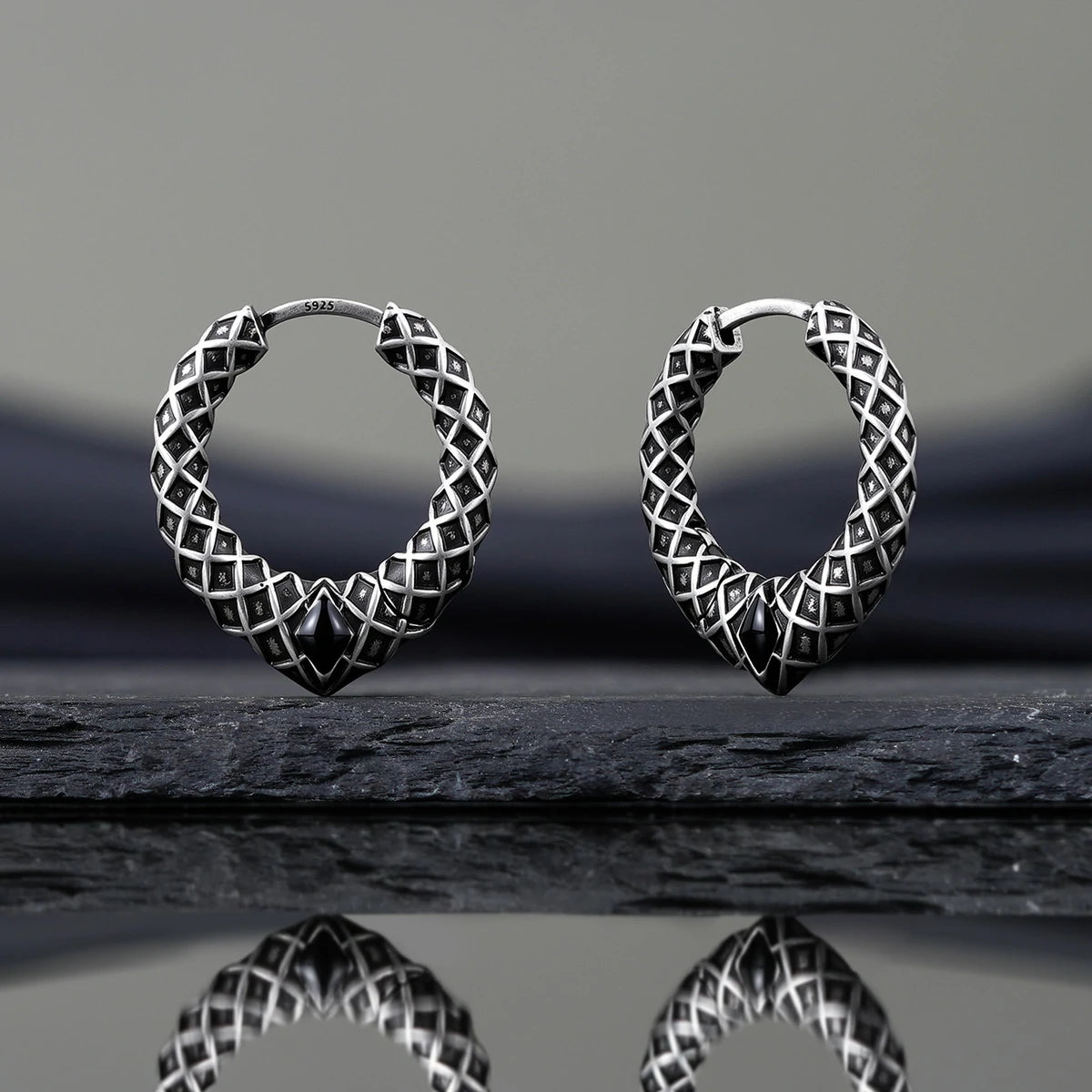 Punkyouth Serpent scale earrings featuring scale-textured hoops and black resin accents, product image 09