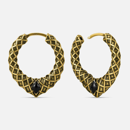 Punkyouth Serpent scale earrings in gold, featuring scale-textured hoops and black resin accents